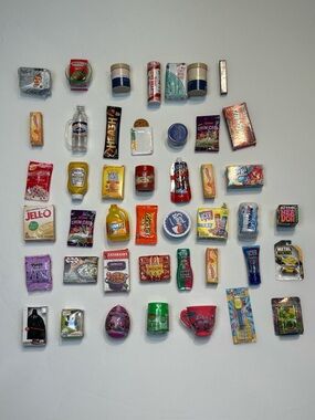 mini food and toys lot for Barbie’s for different brands.